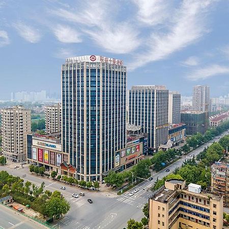 Vienna International Hotel Jiujiang Shili Street Exterior foto