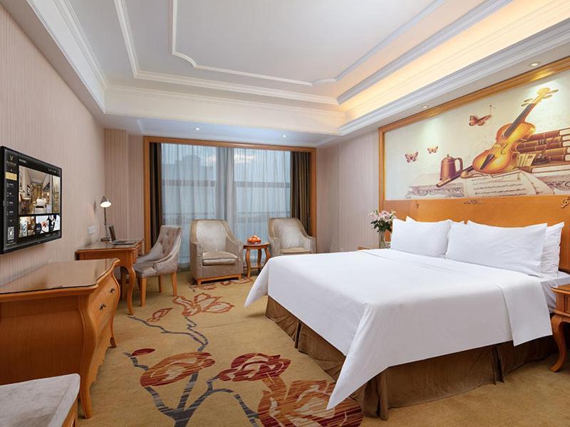 Vienna International Hotel Jiujiang Shili Street Exterior foto
