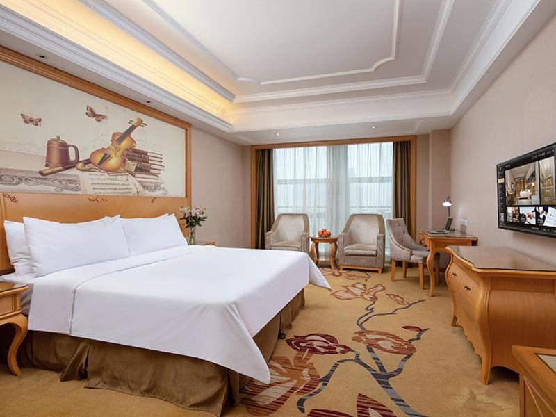 Vienna International Hotel Jiujiang Shili Street Exterior foto