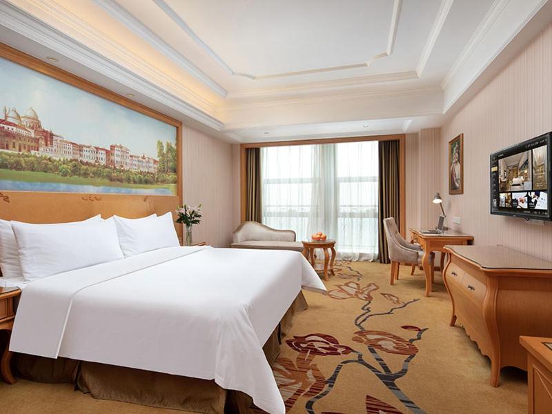 Vienna International Hotel Jiujiang Shili Street Exterior foto